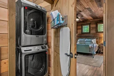 Laundry is in the hallway on the main level of the cabin.