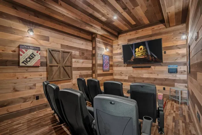 Your own private cinema awaits! Plush recliners & a tv screen - downstairs.