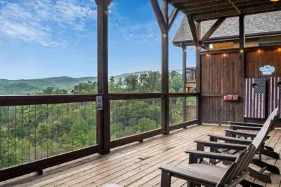 Unwind on the lower deck, where twinkling lights, a bubbling hot tub, and inviting chairs create the perfect atmosphere. Take in the views or enjoy a laid-back evening game of cornhole.