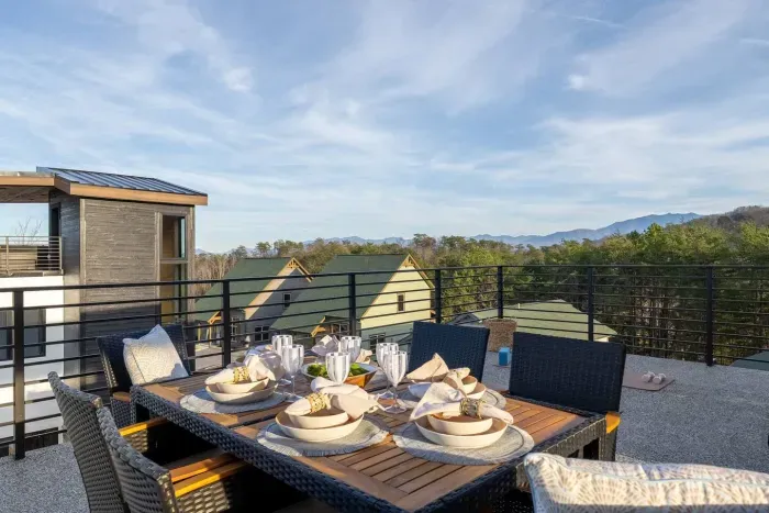 Set the scene for a perfect evening—gather around the rooftop table, where soft lighting, mountain air, and a beautiful view make every dinner feel like a special occasion.
