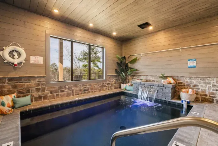 The indoor pool is 4 feet deep—perfect for a refreshing dip or laid-back swim. It features a calming waterfall for added ambiance and is equipped with a pool alarm for extra safety and peace of mind during your stay.
