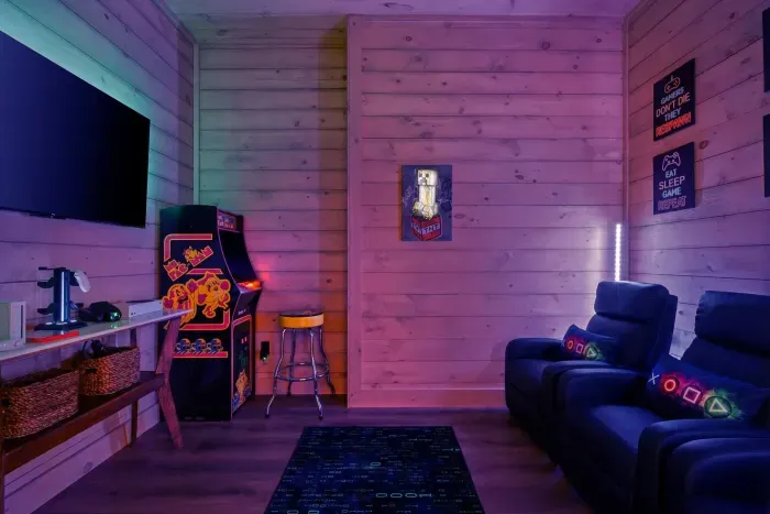 The game room is a vibrant, LED-lit hangout made for all ages. Dive into nostalgia with the classic pacman arcade machine, or jump into fun with the Wii and Xbox.