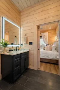 The master bathroom is designed with spa-like touches to elevate your stay. Thoughtful amenities include shower steamer pod, eye masks, shampoo, conditioner, body wash, lotion, tampons, cotton pads, and Q-tips- everything you need and more.