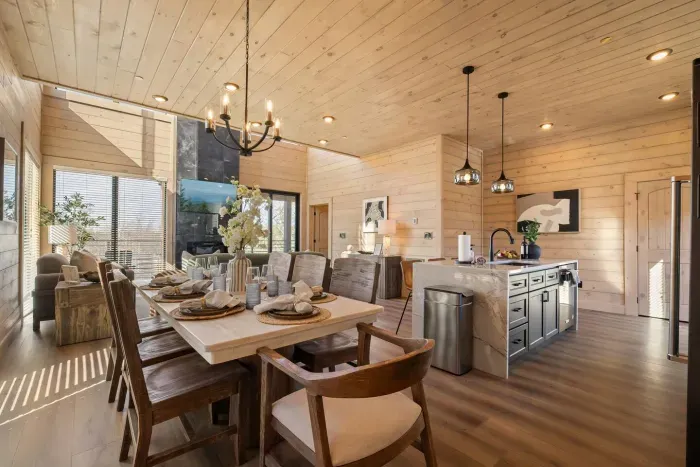 This modern, comfortable kitchen table seats eight and sits right in the center of the action. Located in the kitchen with a clear view of the living room TV, it’s perfect for meals, game nights, or just hanging out together.

