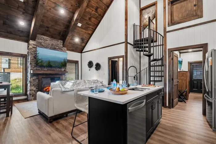 Open-concept kitchen and living room — bright, connected, and made for easy gathering.