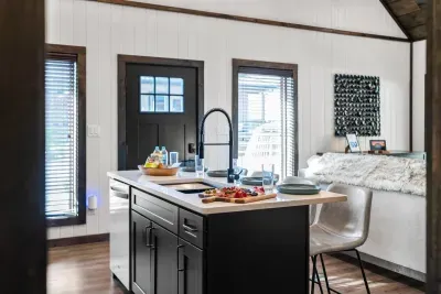 Sleek kitchen island with integrated sink, blending style and function for seamless cooking and entertaining.