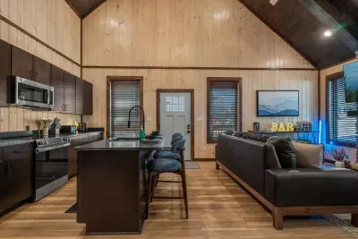 Warm vibes from island to fireplace.