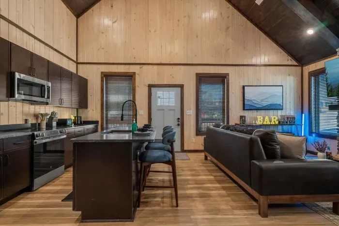 Warm vibes from island to fireplace.