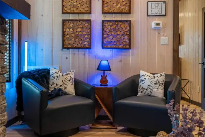 Two cozy chairs, warm lighting, and a little Blue Jean Baby charm.