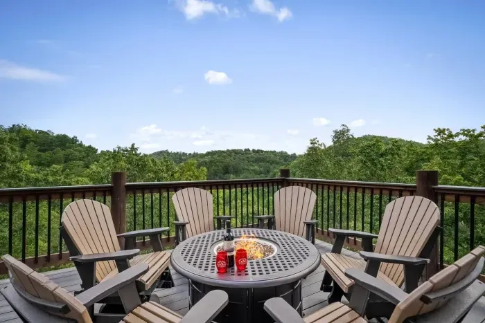 Six seats circle the fire pit—perfect for sharing a glass of wine or sipping hot cocoa under the mountain sky.