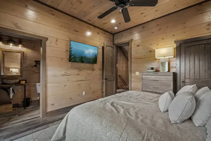 Unpack, unwind, and make yourself at home in the master suite—featuring a king bed, bedside table, room for your clothes, and your own en suite bathroom for privacy and comfort. 