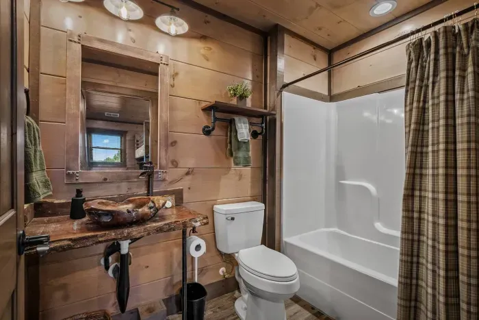 The bunk room comes with its own en suite bathroom, giving kids (or adults) their own private space to get ready. 