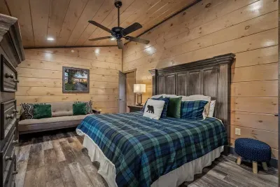 With its green plaid touches and convertible futon couch, the fourth bedroom is designed for both relaxation and function—whether it’s an extra hangout spot or an additional sleeping area.