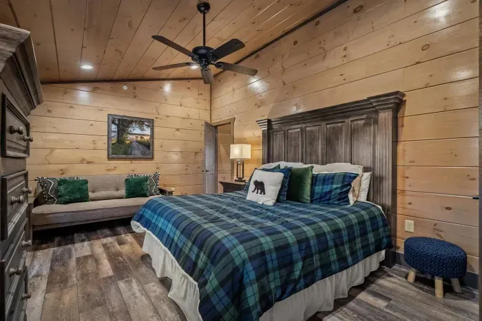 With its green plaid touches and convertible futon couch, the fourth bedroom is designed for both relaxation and function—whether it’s an extra hangout spot or an additional sleeping area. 
