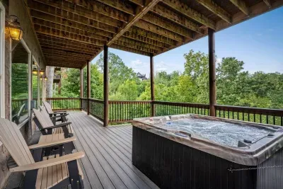 Unwind downstairs on the balcony just off the pool room — where the hot tub bubbles.