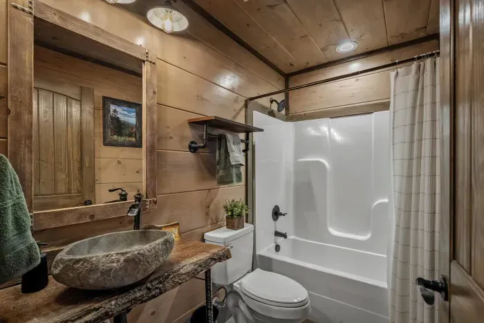 This bathroom is styled with fresh décor and stocked with essentials, giving guests their own private space to refresh and unwind.