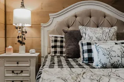 The second king bedroom offers everything you need: bedside table, storage, and cozy touches that make it feel like your own private retreat.