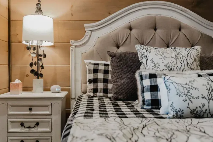 The second king bedroom offers everything you need: bedside table, storage, and cozy touches that make it feel like your own private retreat.
