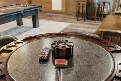 A fresh deck of playing cards lies mid-shuffle, inviting your group to dive into a game.