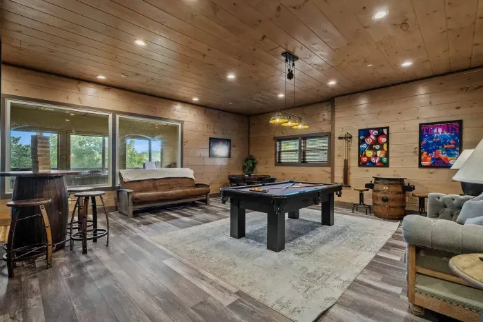 From the game room’s tall windows, you can look directly down into the indoor pool area — perfect for keeping an eye on the kids while they swim or just enjoying the lively atmosphere from above.