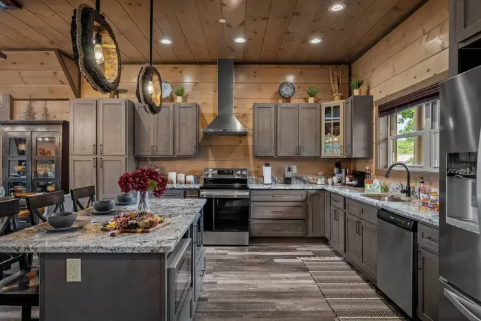 Large spacious, fully stocked kitchen. 3 bar seats.