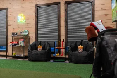 Spacious game room with lounge seating and entertainment
