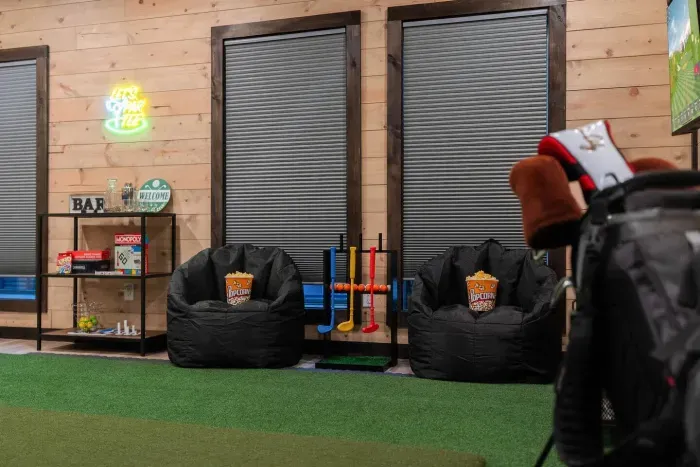 Spacious game room with lounge seating and entertainment