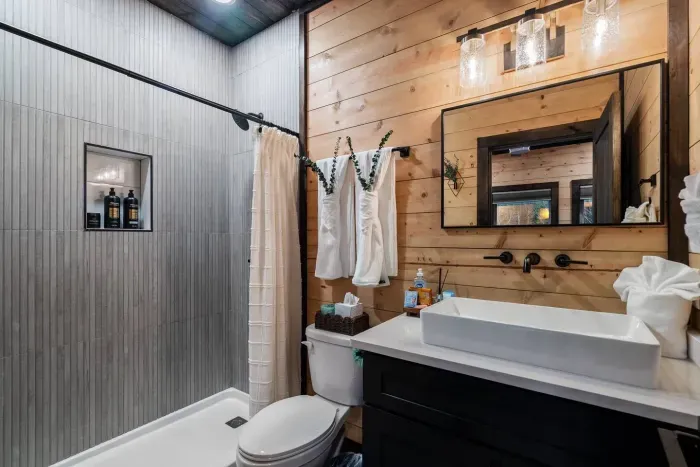 Full bath featuring a sleek vanity and walk-in shower