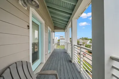 The covered balcony off the second floor is the spot for a quiet coffee, shaded even in the middle of the day.