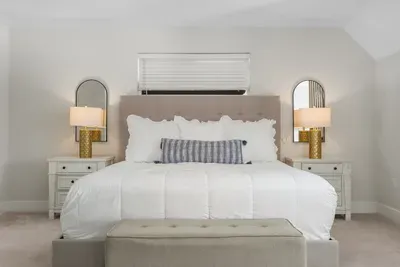 King bed in the primary suite, with its own mini-split so you can set the third floor to whatever temperature you sleep best in.