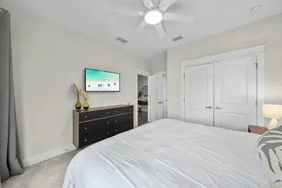 King bedroom with its own TV and a full closet, so everyone has somewhere to unpack.