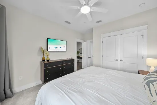 King bedroom with its own TV and a full closet, so everyone has somewhere to unpack.