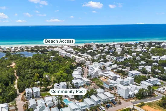 Your stretch of 30A from above. The Dune Allen Regional Beach access sits just south of the house, with the community pool tucked into the neighborhood behind it.