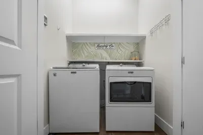 A full-size Maytag washer and dryer on the main level. Pack lighter, and send the sandy towels through mid-week.