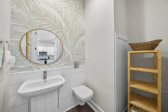 A half bath on the main level, right by the laundry, so nobody has to head upstairs mid-meal.