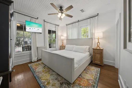 The spacious master suite offers a king bed, ceiling fan, and a private ensuite — your quiet retreat after a day in the sun.