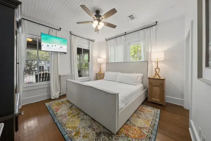 The spacious master suite offers a king bed, ceiling fan, and a private ensuite — your quiet retreat after a day in the sun.