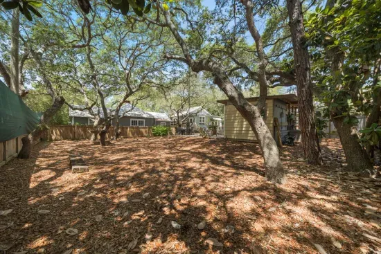 Beyond the patio, a fully fenced yard gives kids and pets extra room to roam and play.