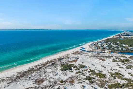 The famous white sand and emerald water of 30A, an easy walk or bike from Lollygag.
