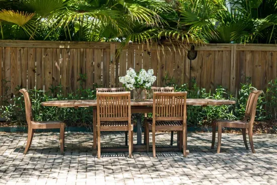 Gather for al fresco meals at the outdoor dining table, set just steps from the pool and grill.