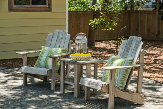 Pull up an Adirondack chair and enjoy the shade and breeze in Lollygag's spacious backyard.