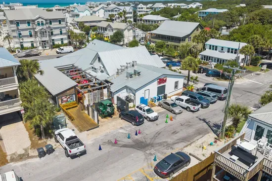 An aerial look at the famous Red Bar — Grayton's iconic dining and live-music spot, just two blocks from your door.
