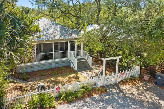 The home's classic Grayton exterior, with a parallel parking pad out front that fits two vehicles.