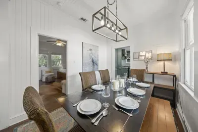 Family dinners come easy here, with a dining table for six set right between the kitchen and living room.