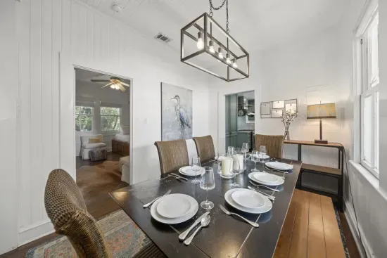 Family dinners come easy here, with a dining table for six set right between the kitchen and living room.