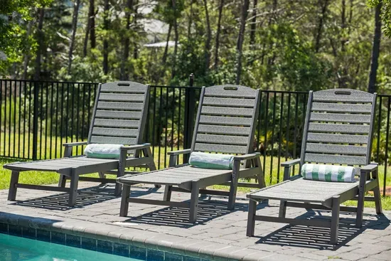 Four Hollywood loungers lined up poolside and ready for a slow afternoon — grab one, unroll a towel, and let the day wind down.