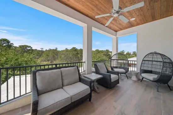 This is where the day ends — settle into a chair, listen to the trees, and let the outside world disappear. The master balcony is yours alone.