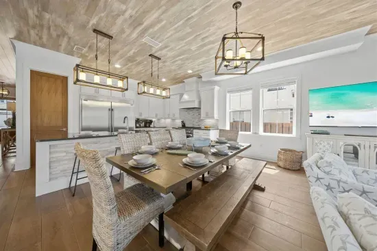 Gather the whole group at the 8-seat farmhouse table — breakfast, board games, or a birthday dinner, there's always room for everyone.