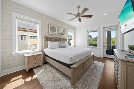 Slip out to the balcony with your morning coffee or an evening cocktail after the beach — the master bedroom is your private retreat above it all.