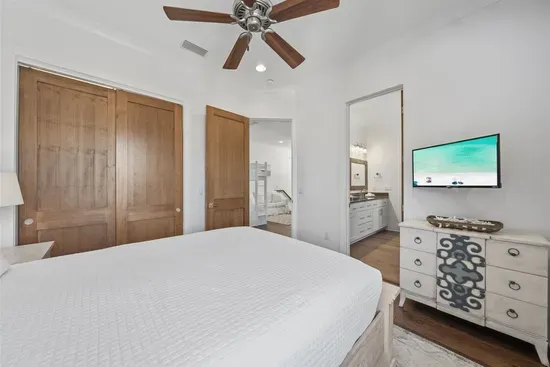 Its own TV, closet, and shared bath access keep everyone comfortable and independent.